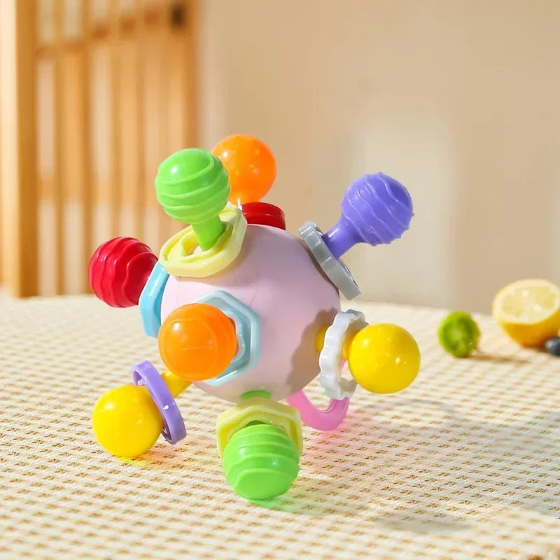 Toys - Teether - 6m to 18m - 👶 📖 Early Sensory & Visual Learning (0–3Y) 🎯 Rotating Rattle Ball Baby Teether – Multi-Sensory Development Toy